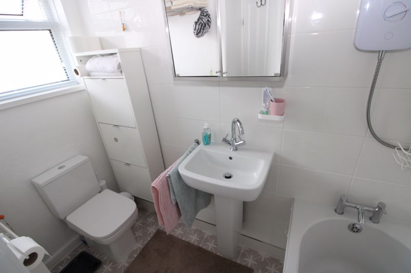 Bathroom with white suite